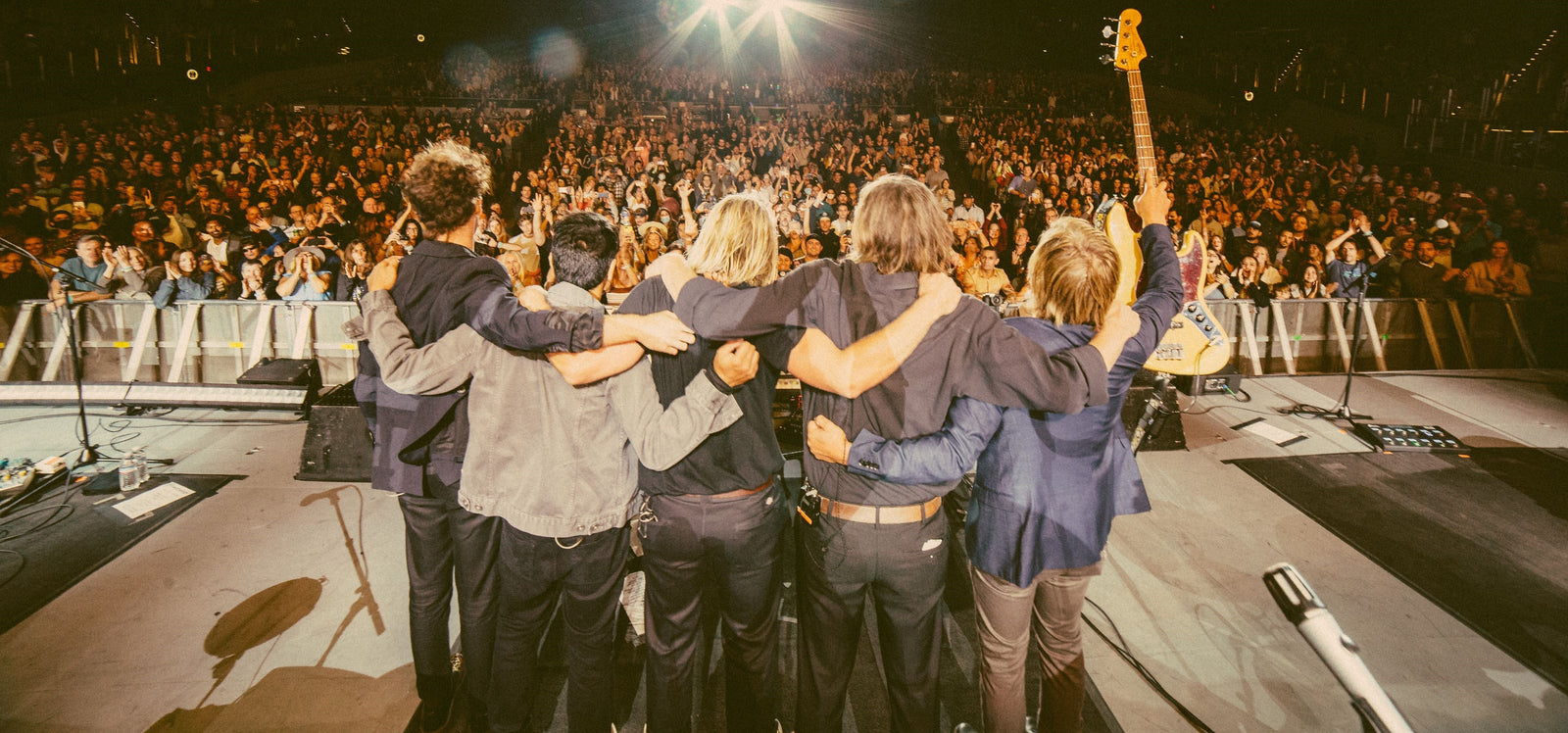 Switchfoot bowing before a crowd
